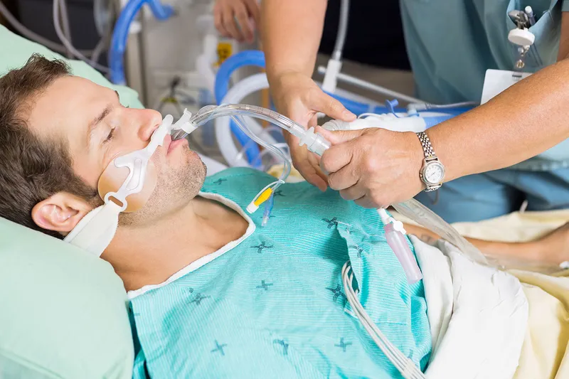 Unconscious patient receiving medical care