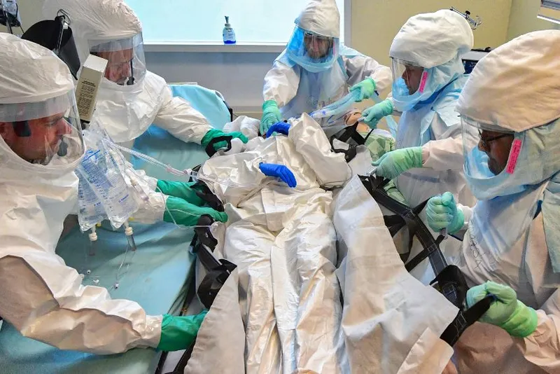 Medical personnel in BSL-4 suits