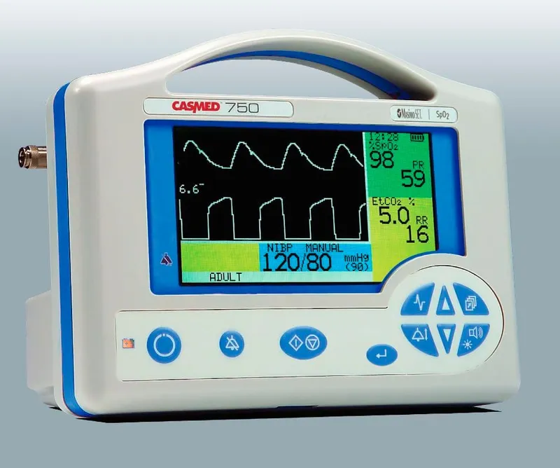 Portable patient monitor displaying vital signs