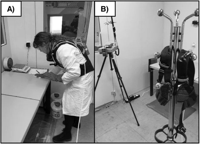 Industrial hygienist using personal air sampling equipment in manufacturing facility