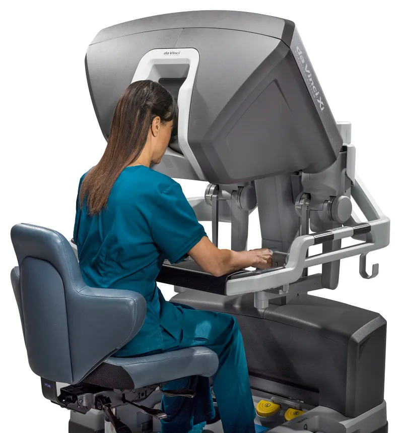Robotic surgical console showing surgeon's perspective and instrument control