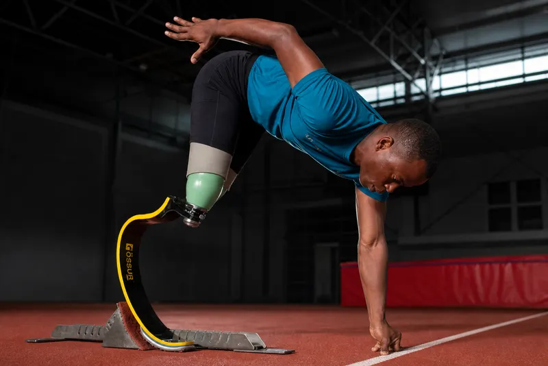 Athlete with running blade prosthesis