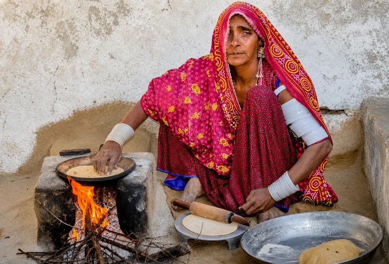 Traditional kitchen with chulha and poor ventilation